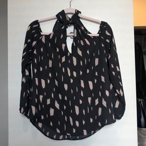 Fun cut out blouse with open shoulders!